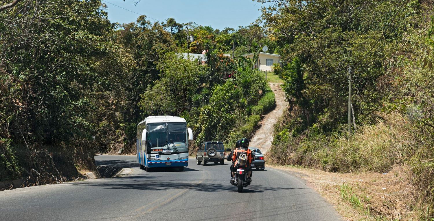 Local bus coming up a hill