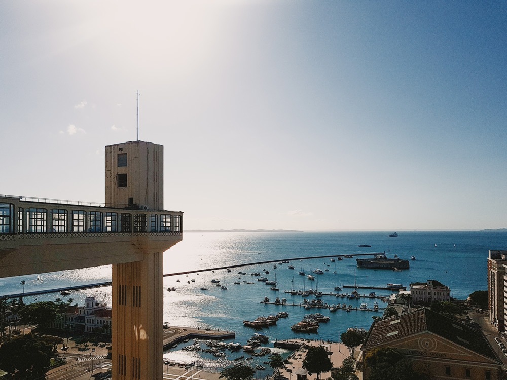 A view looking out at Bay of All Saints, with Elevador Lacerda on the left, a public elevator that carries people between the upper city and lower city.