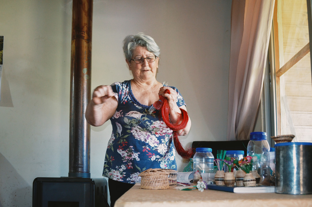 Artisan Guadalupe Sepulveda, 84, demonstrating some of the techniques she has learned over the years