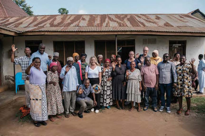 Executive Director of HelpAge Tanzania Smart Daniel (back row, second from left) convened a meeting of the Korogwe TC OPF and the Leaders of the Mtonga Active Aging Club Income- Generating Group members