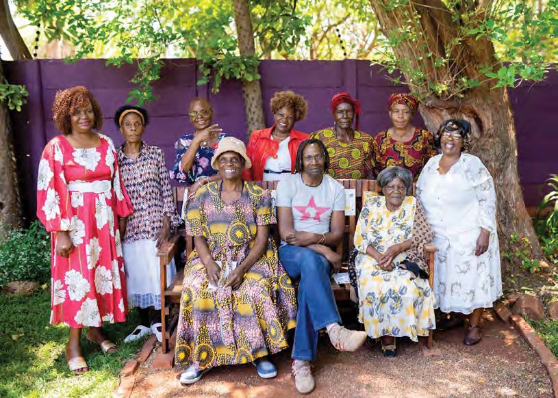 Dixon Chibanda, founder of Friendship Bench, with a group of “grandmothers” delivering community-based mental health care.