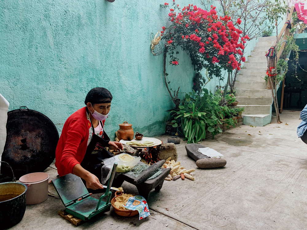 Flavia de Albino Ortega preparing food at her home in the town of Huamantla